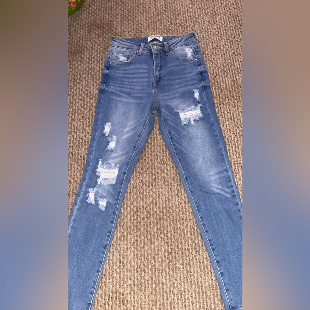Junior girls distressed jeans.